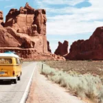 Open scenic highway at golden sunrise representing journey mercies and safe travel blessings