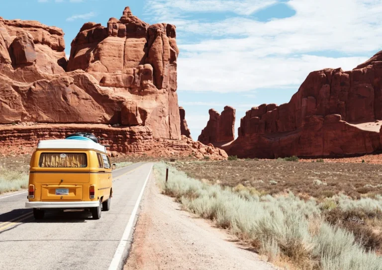 Open scenic highway at golden sunrise representing journey mercies and safe travel blessings